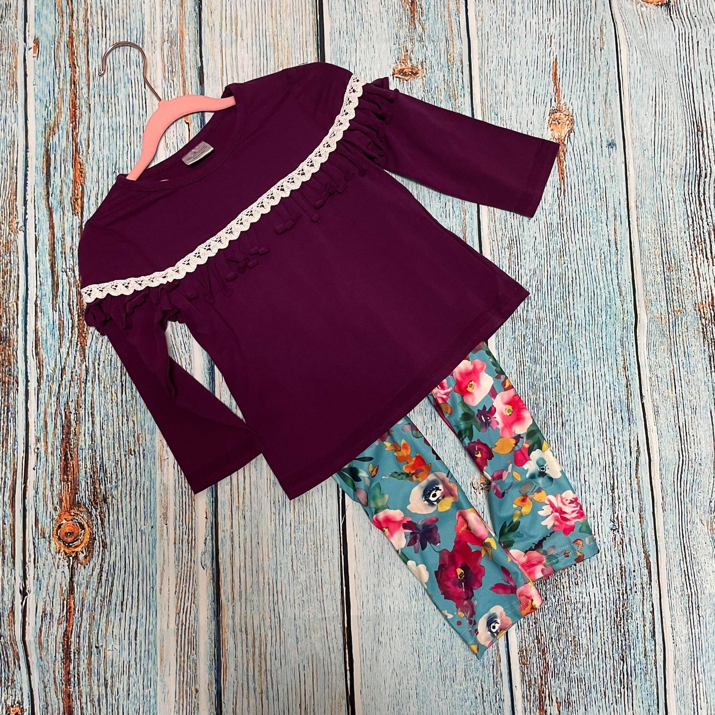 Purple top with floral pants